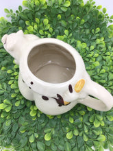 Load image into Gallery viewer, Tom the Piper's Son Holding Pig Ivory 1940s Shawnee Pottery Ceramic