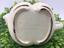 Load image into Gallery viewer, Tom the Piper's Son Holding Pig Ivory 1940s Shawnee Pottery Ceramic