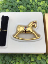 Load image into Gallery viewer, Estee Lauder Gold Tone Rocking Horse Perfume Compact
