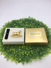 Load image into Gallery viewer, Estee Lauder Gold Tone Rocking Horse Perfume Compact
