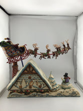 Load image into Gallery viewer, Heartwood Creek DREAMS FLY Santa in Sleigh Over House Figure
