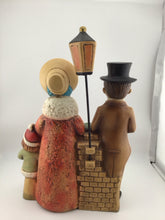 Load image into Gallery viewer, Family 4 Carolers Lamp post Japan 11x8"
