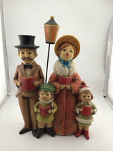 Load image into Gallery viewer, Family 4 Carolers Lamp post Japan 11x8"
