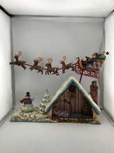 Load image into Gallery viewer, Heartwood Creek DREAMS FLY Santa in Sleigh Over House Figure
